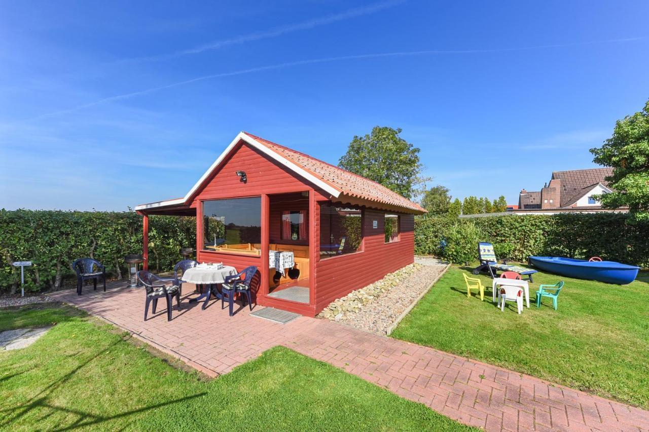 Friesenmeer Ferienwohnung Eins Bensersiel Bagian luar foto