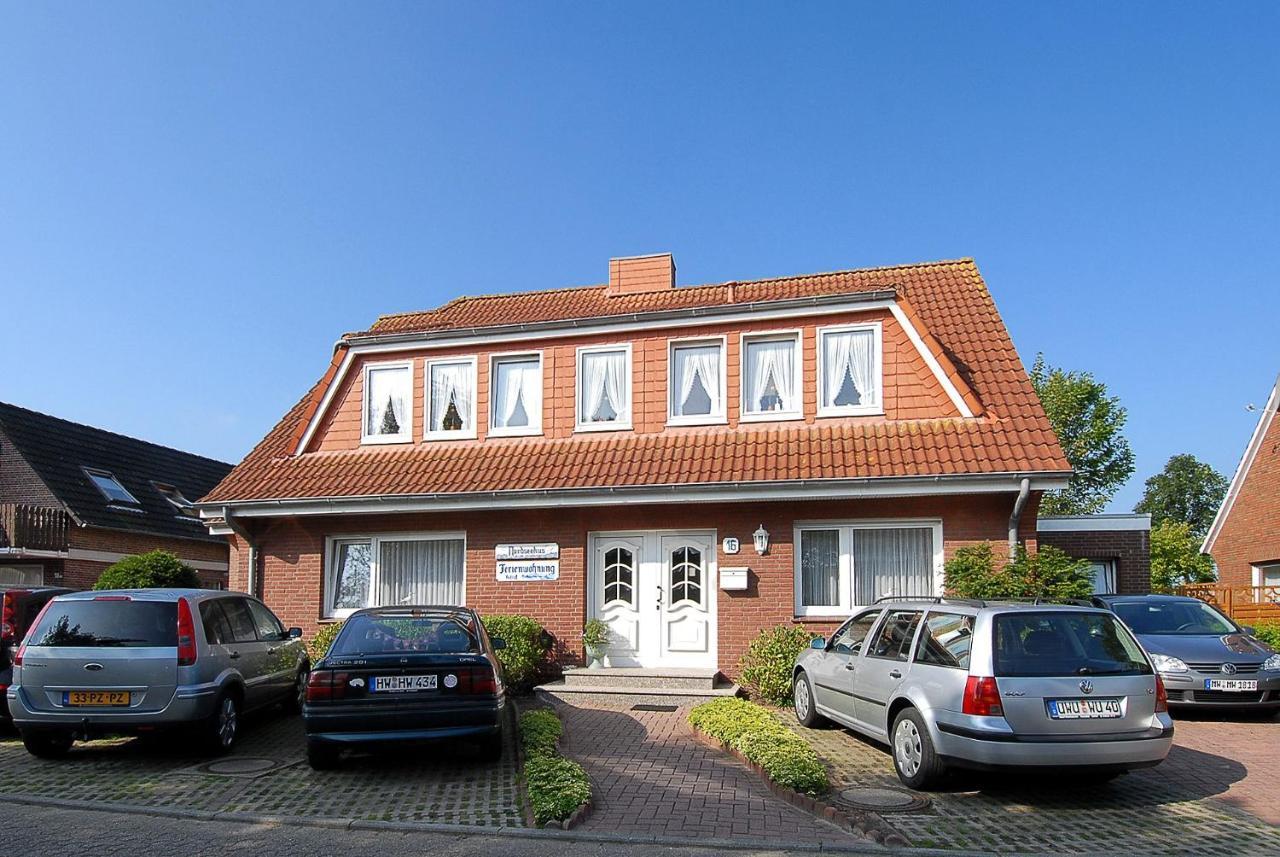 Friesenmeer Ferienwohnung Eins Bensersiel Bagian luar foto