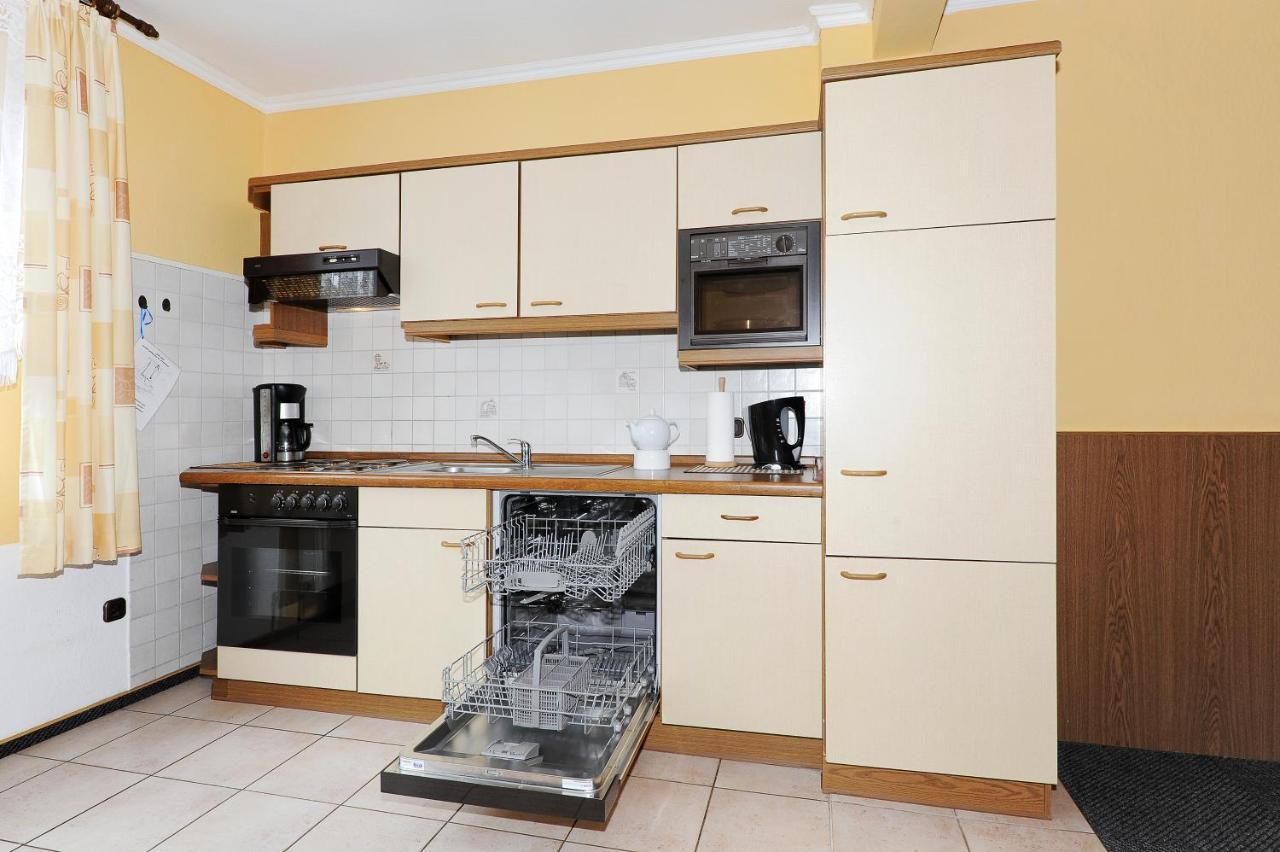 Friesenmeer Ferienwohnung Eins Bensersiel Bagian luar foto