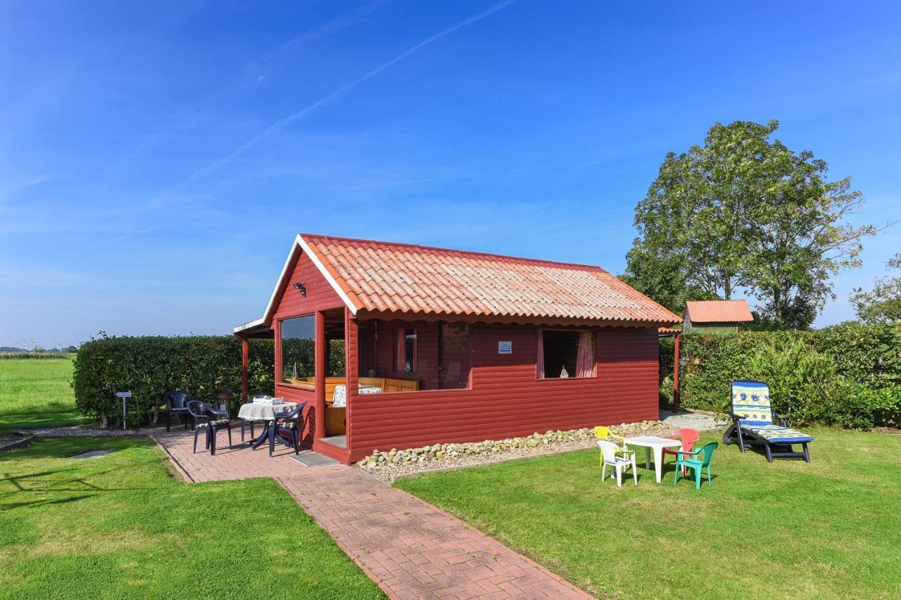 Friesenmeer Ferienwohnung Eins Bensersiel Bagian luar foto